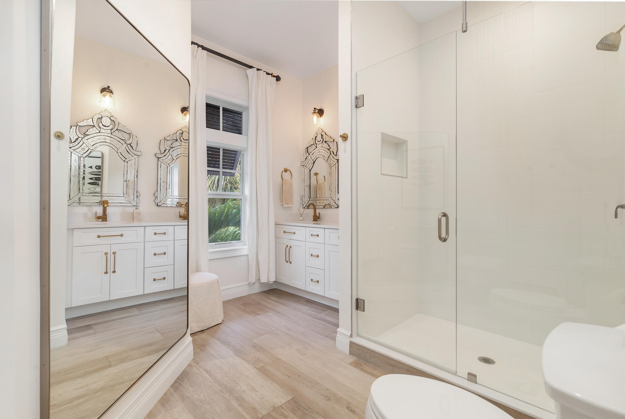 140 Edmor Road West Palm Beach, FL 33405 - Photo 21 of 30 a bathroom with a shower a sink and mirror