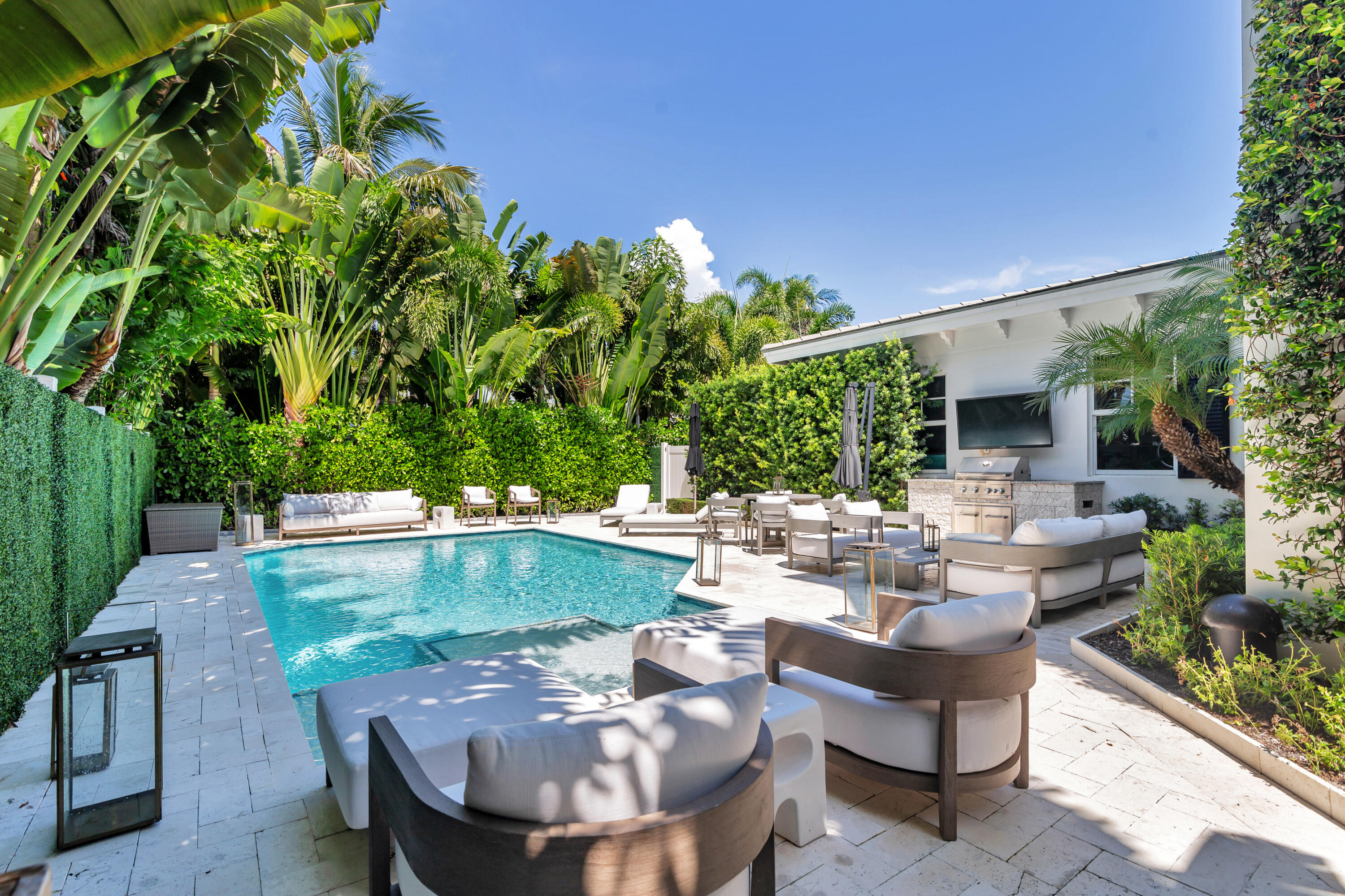 140 Edmor Road West Palm Beach, FL 33405 - Photo 23 of 30 a view of swimming pool with outdoor seating and green space