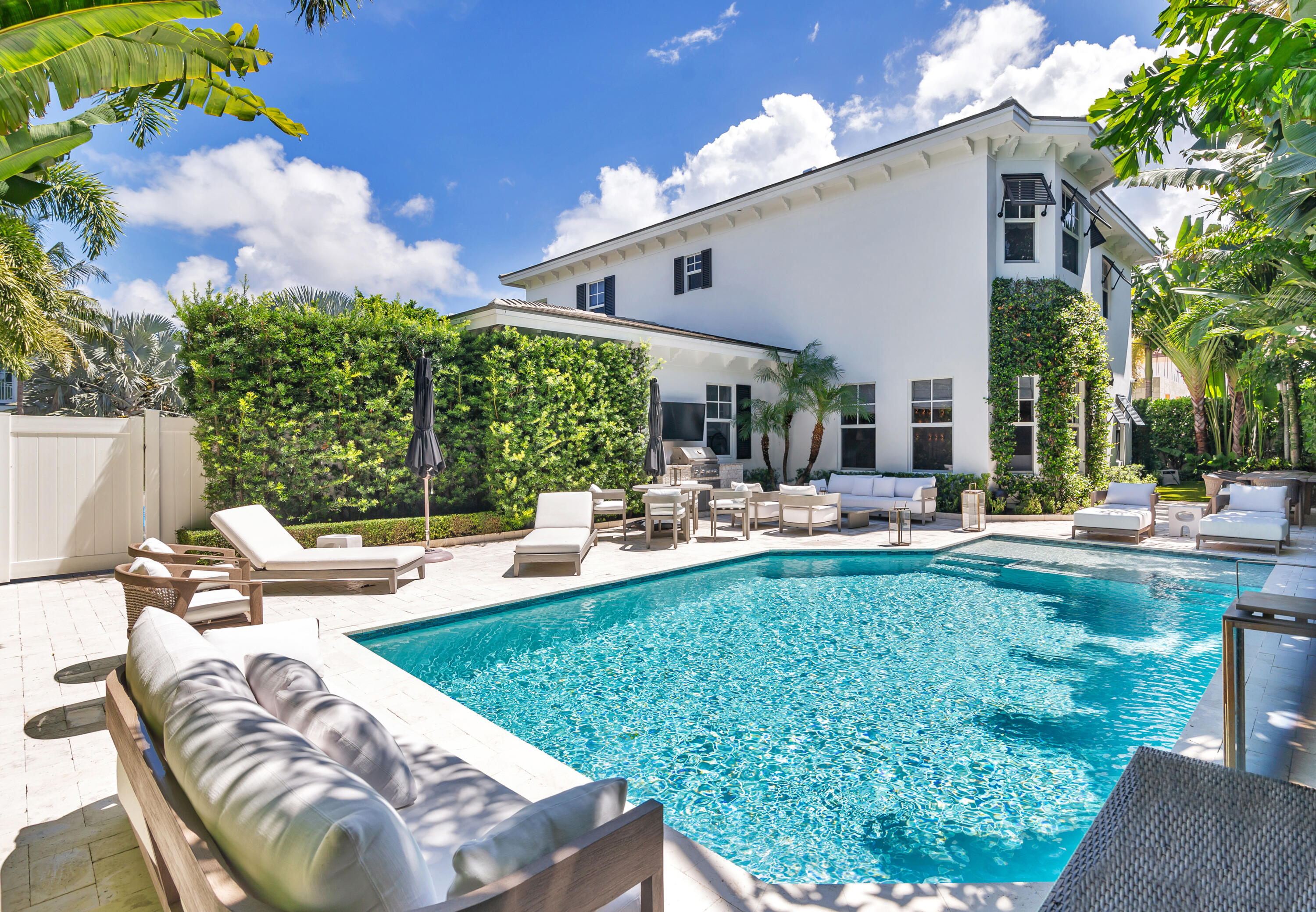 140 Edmor Road West Palm Beach, FL 33405 - Photo 24 of 30 a view of swimming pool with outdoor seating and patio