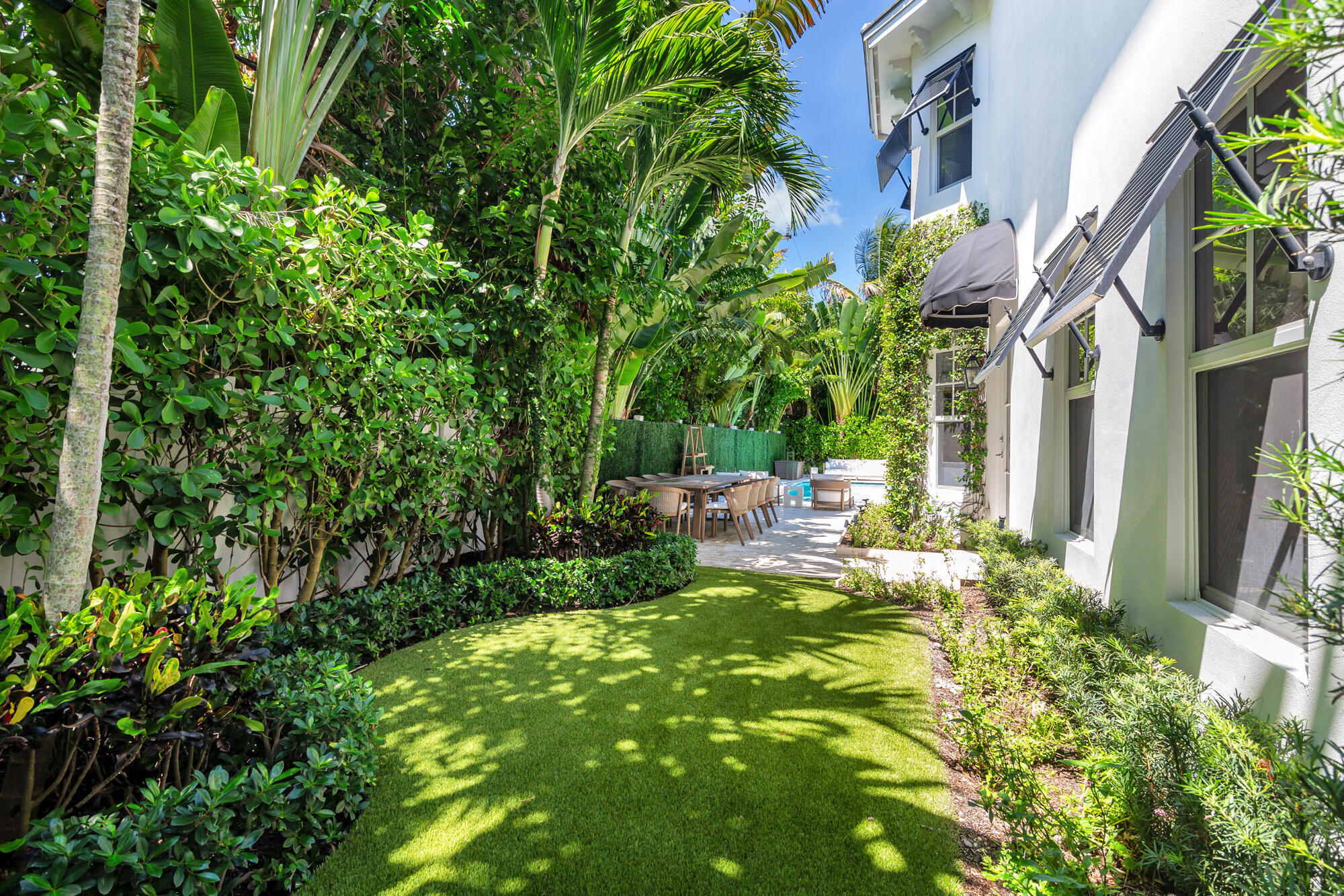 140 Edmor Road West Palm Beach, FL 33405 - Photo 27 of 30 a view of yard with swimming pool and sitting area