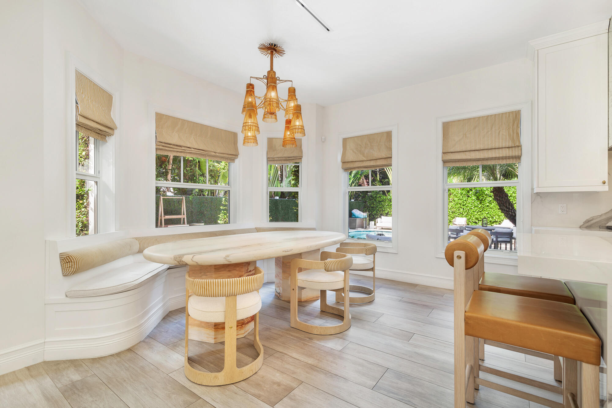 140 Edmor Road West Palm Beach, FL 33405 - Photo 9 of 30 a living room with dining table furniture and a large window