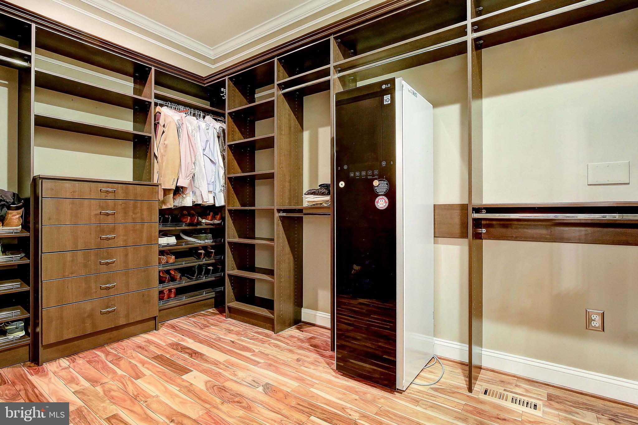 3300 Holland Cliffs Road Huntingtown, MD 20639 - Photo 31 of 93 a view of walk in closet with clothes and shoes