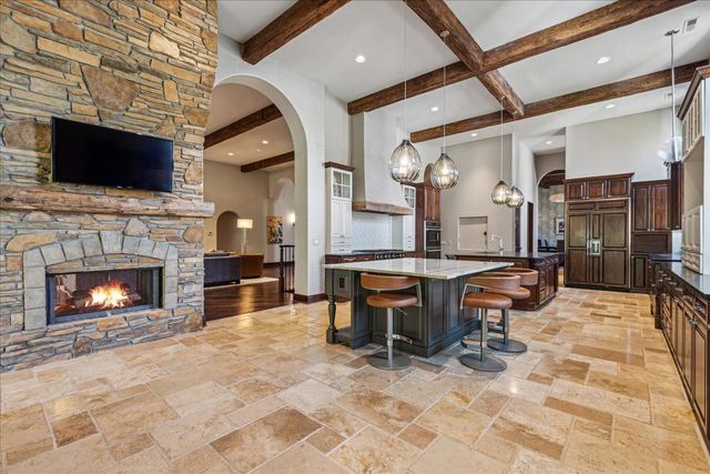 a view of a dining room and livingroom with furniture