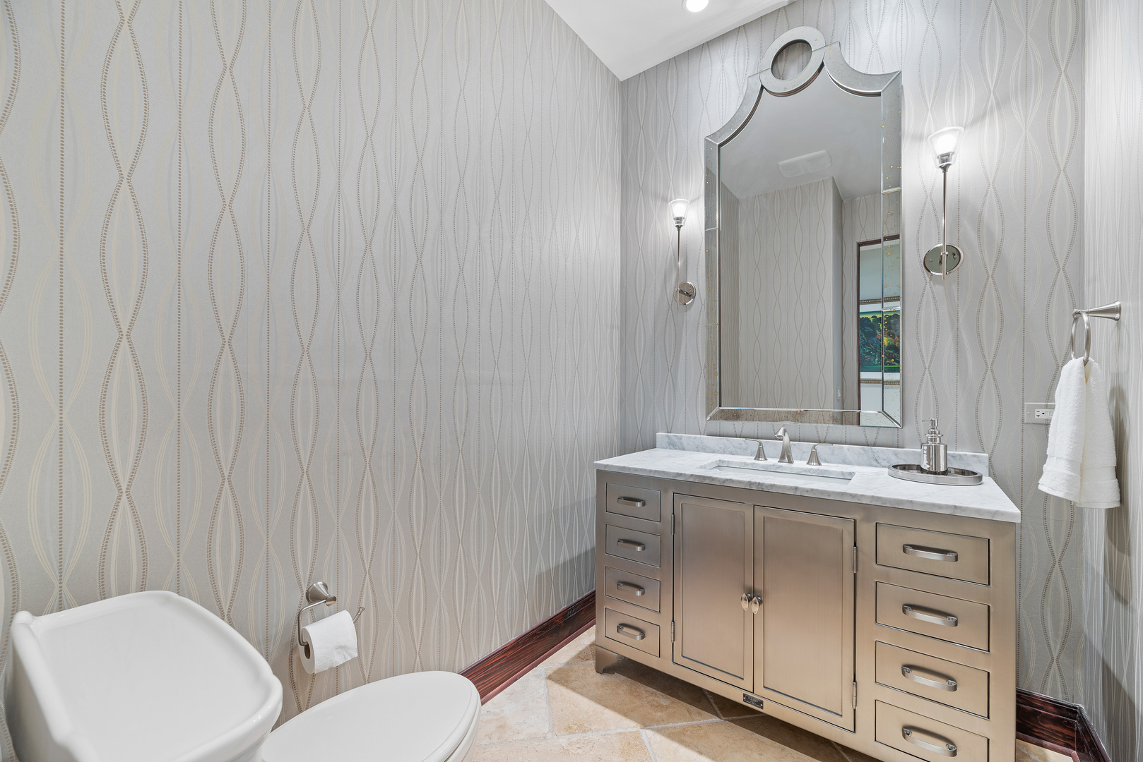 493 Hazel Avenue Highland Park, IL 60035 - Photo 17 of 52 a bathroom with a toilet a sink and mirror