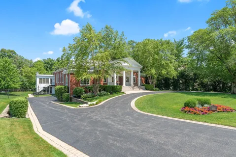 an aerial view of a house with balcony