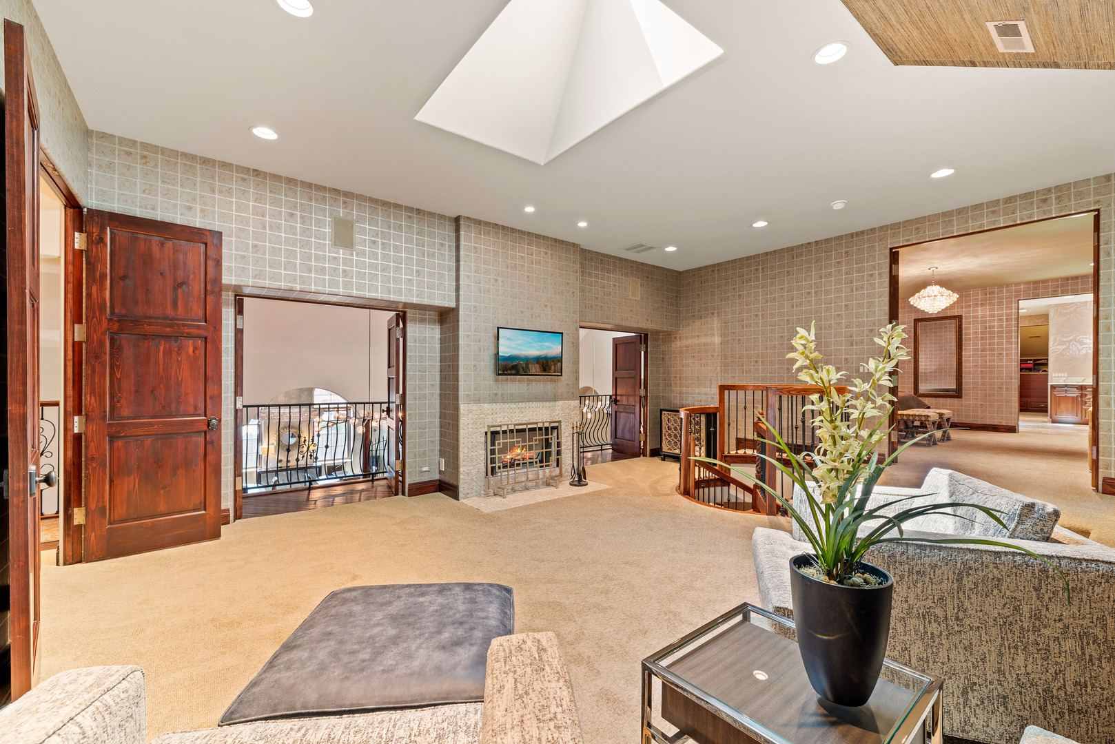 493 Hazel Avenue Highland Park, IL 60035 - Photo 22 of 52 a living room with furniture a chandelier and a potted plant