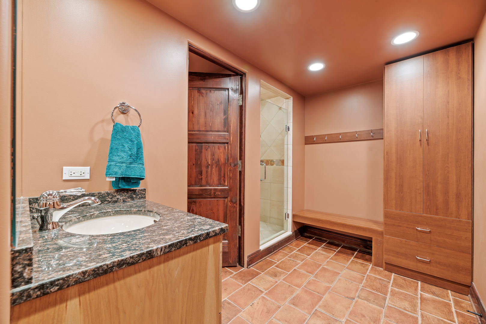 493 Hazel Avenue Highland Park, IL 60035 - Photo 39 of 52 a bathroom with a granite countertop sink and a mirror