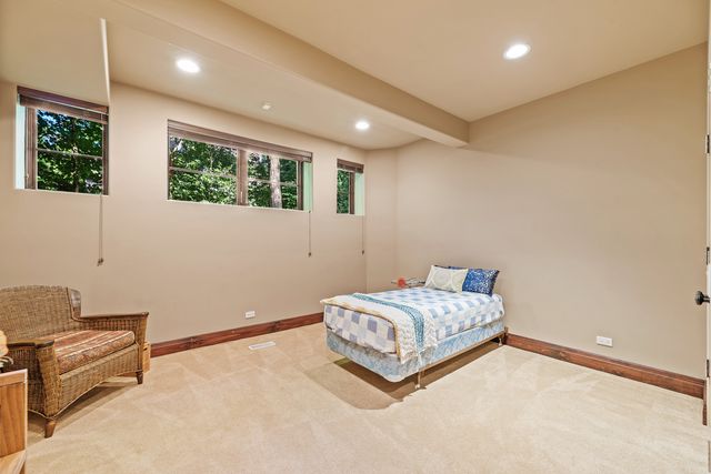 a bathroom with a toilet a sink and a shower