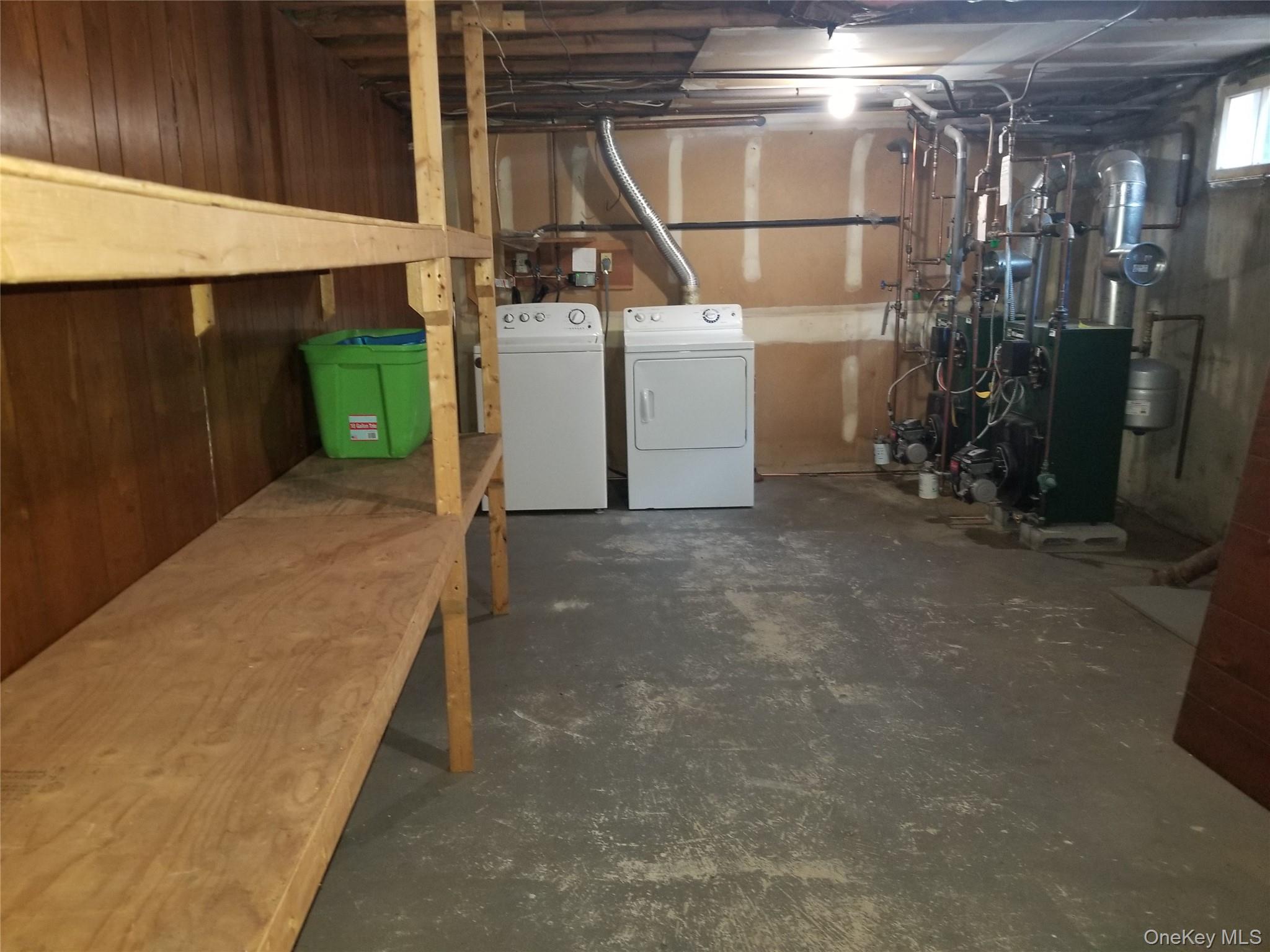 74 Ashwood Road, Unit 1 Port Washington, NY 11050 - Photo 16 of 17 laundry and storage