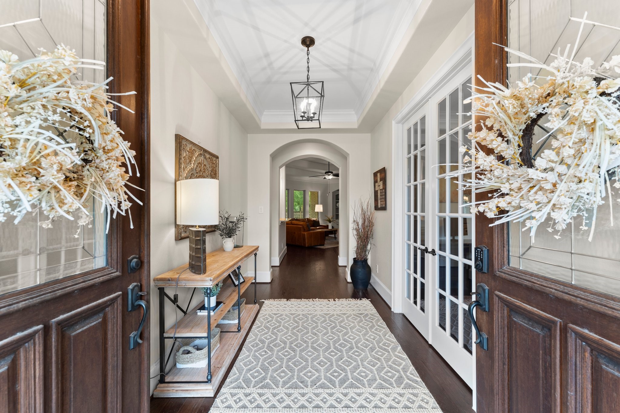 5006 Newport Court Spring, TX 77386 - Photo 12 of 46 a view of a hallway with wooden floor and staircase