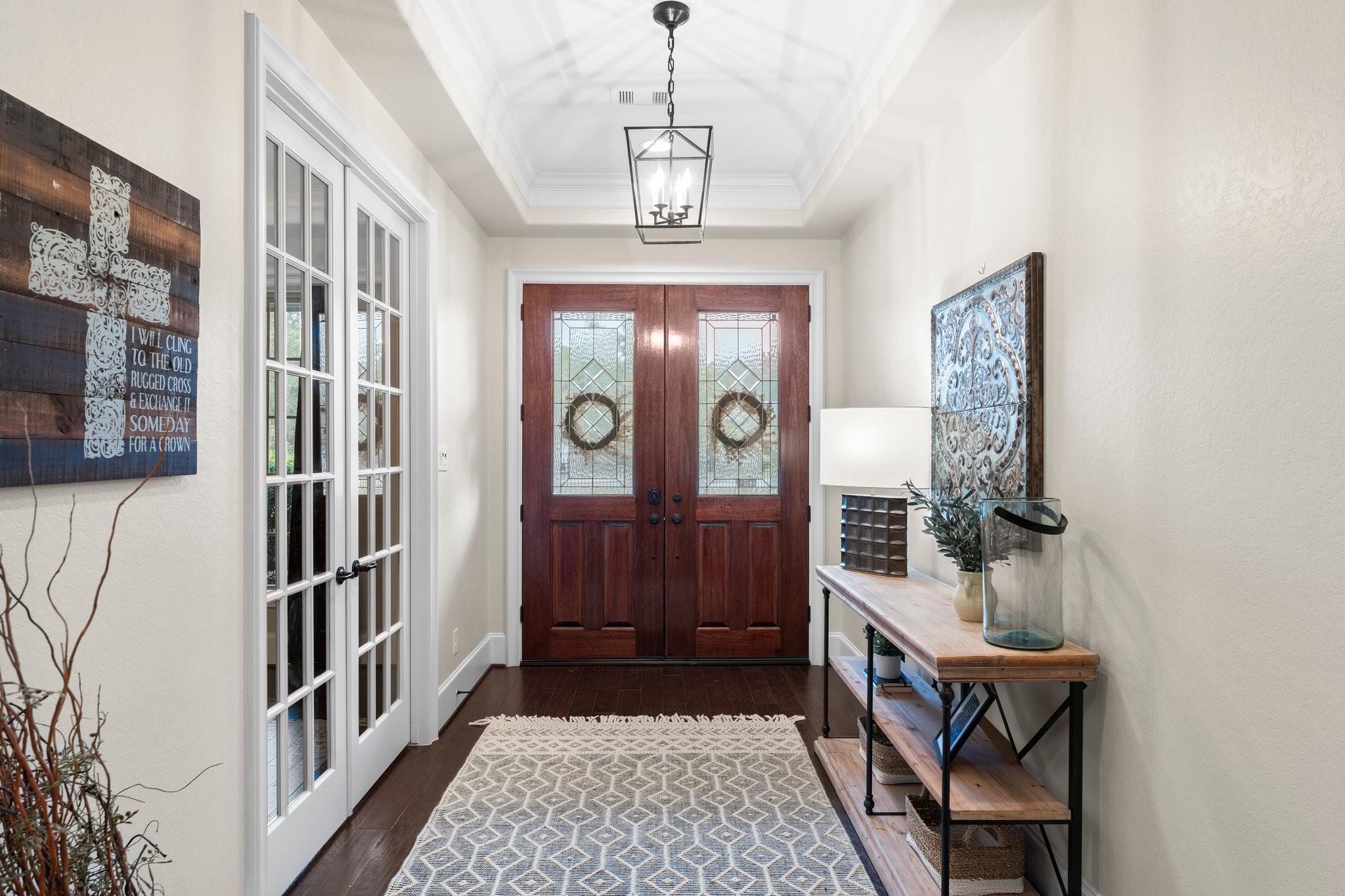 5006 Newport Court Spring, TX 77386 - Photo 13 of 46 a view of a hallway with wooden floor and windows