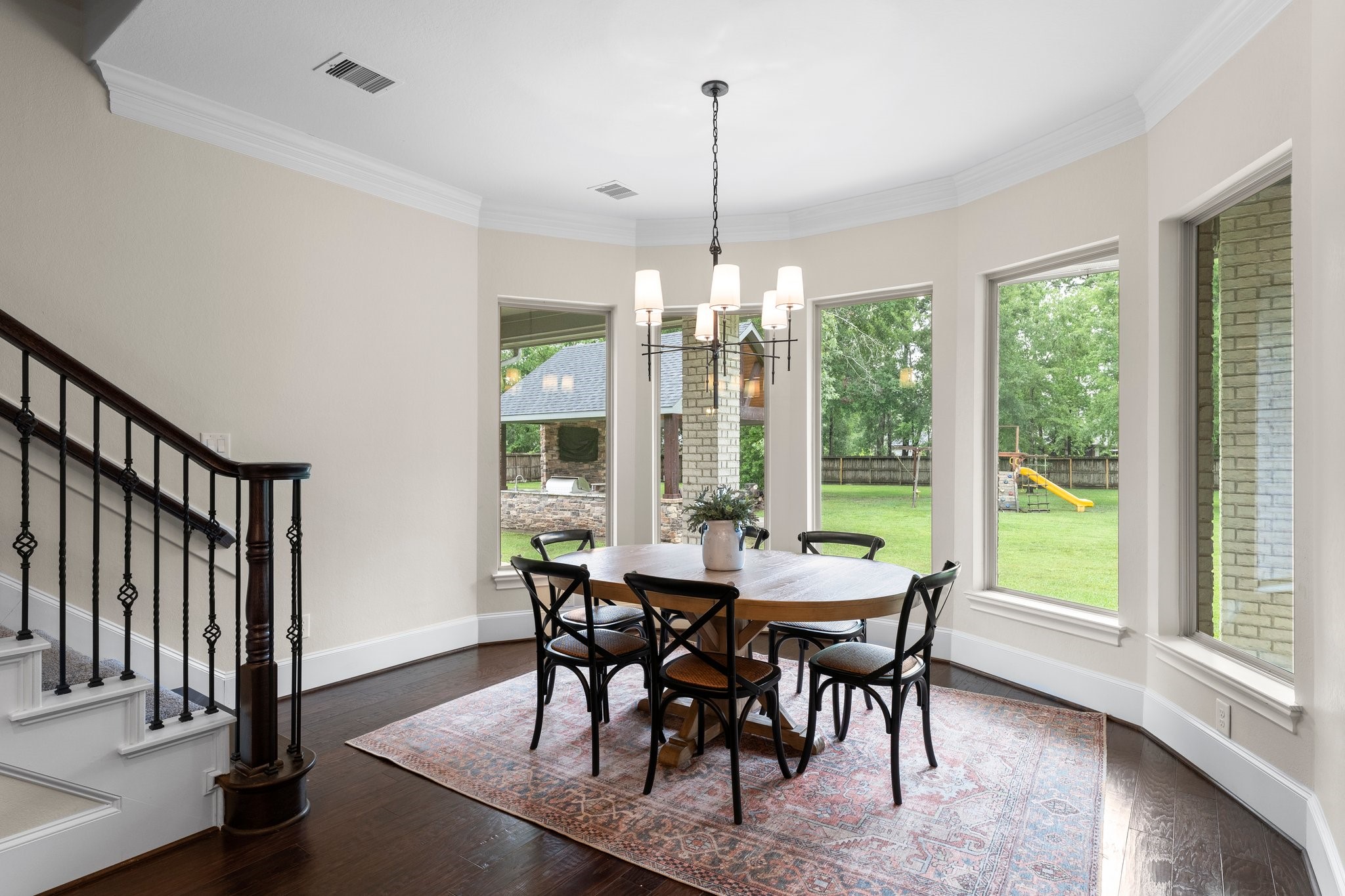 5006 Newport Court Spring, TX 77386 - Photo 22 of 46 a view of a dining room with furniture window and wooden floor