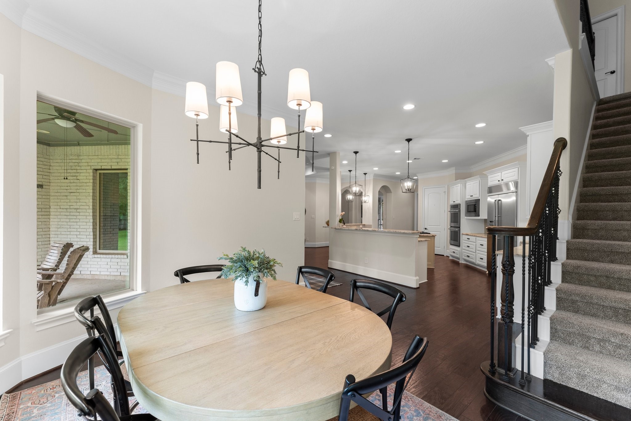 5006 Newport Court Spring, TX 77386 - Photo 23 of 46 a view of a dining room with furniture