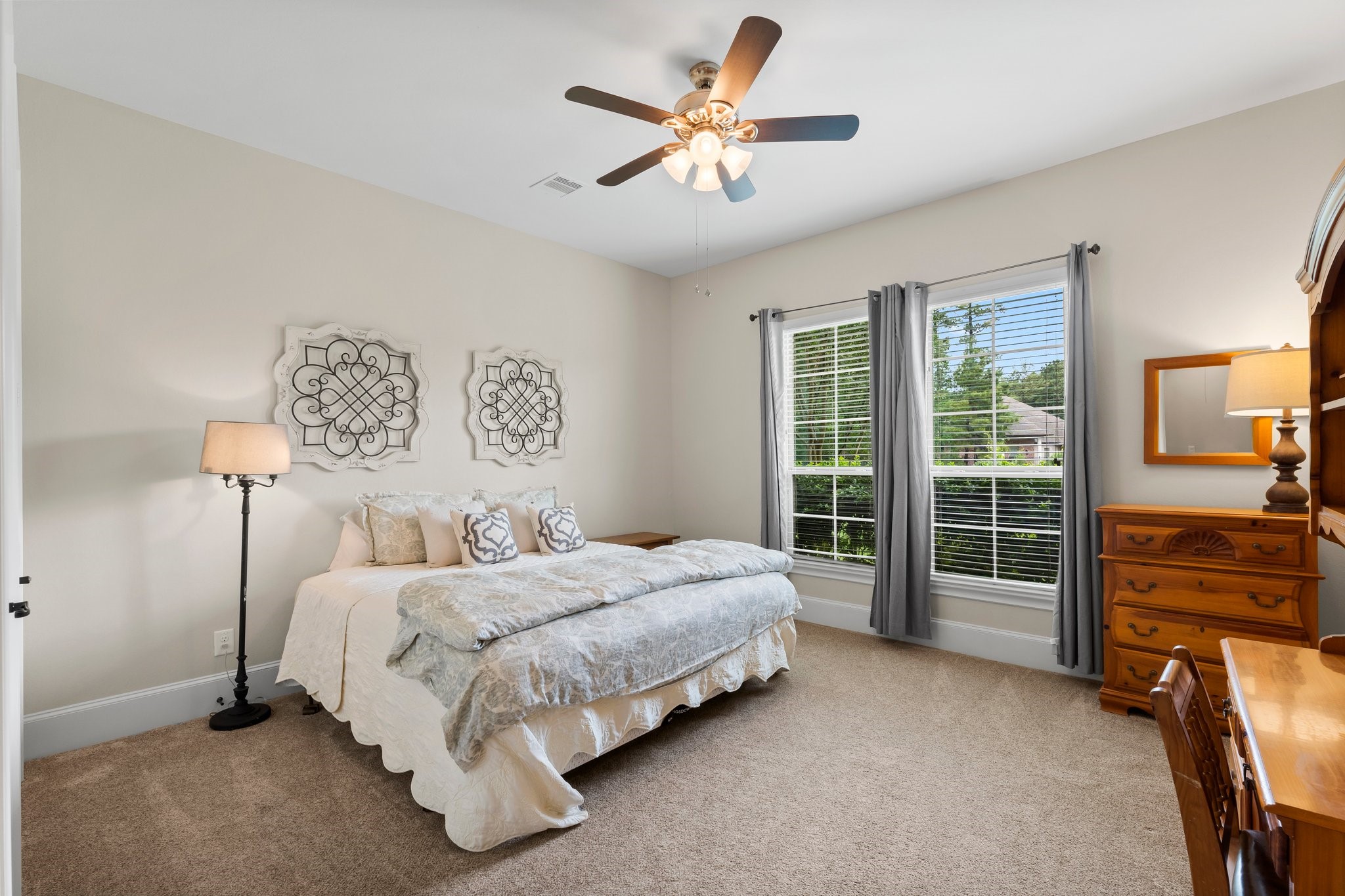 5006 Newport Court Spring, TX 77386 - Photo 37 of 46 a bedroom with a bed and a large window