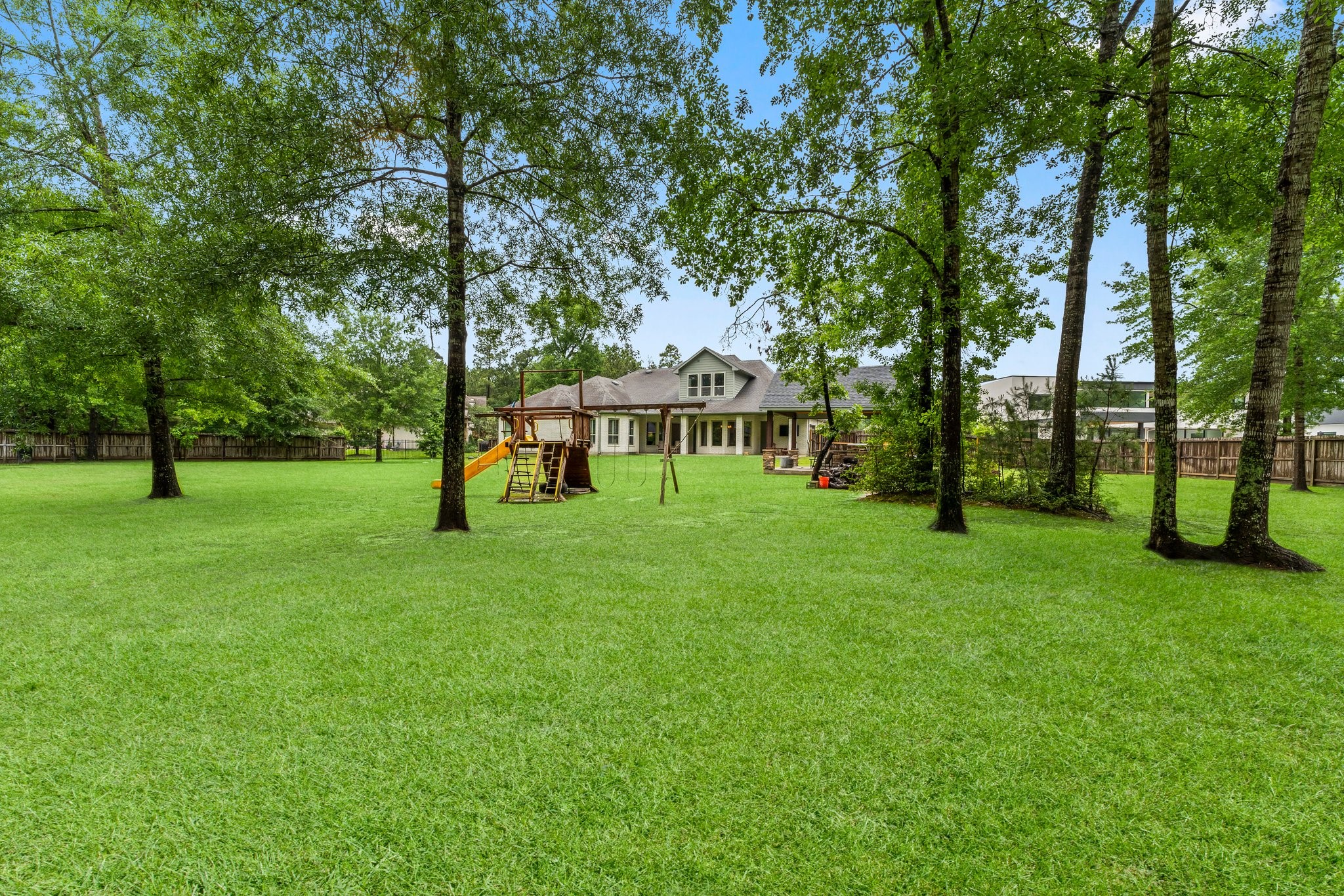 5006 Newport Court Spring, TX 77386 - Photo 42 of 46 a view of house with a backyard