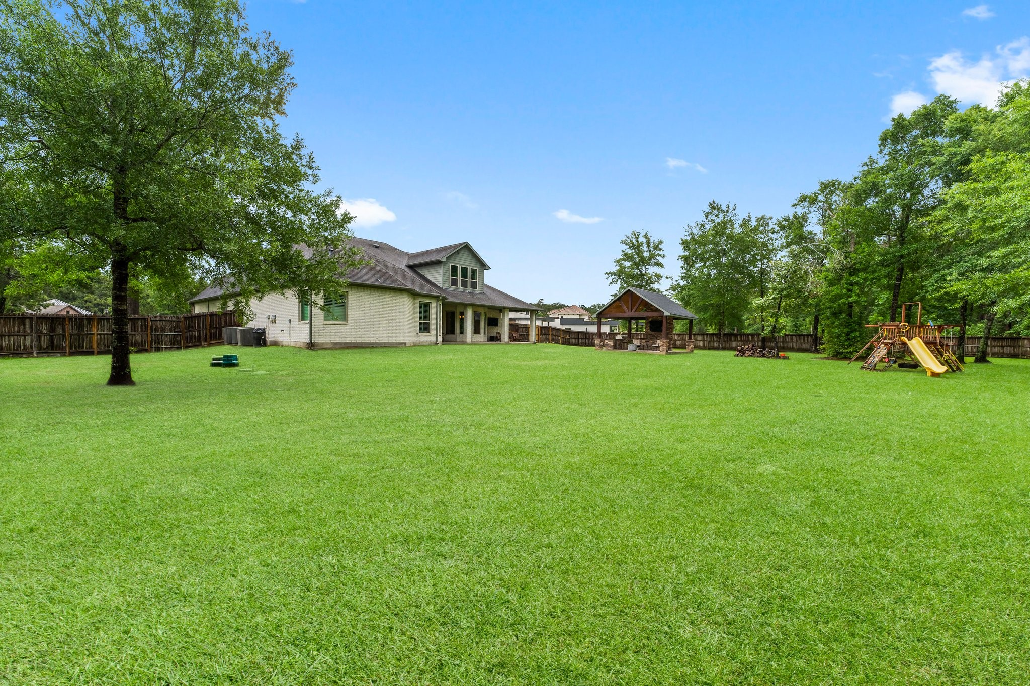 5006 Newport Court Spring, TX 77386 - Photo 43 of 46 a view of a house with a park