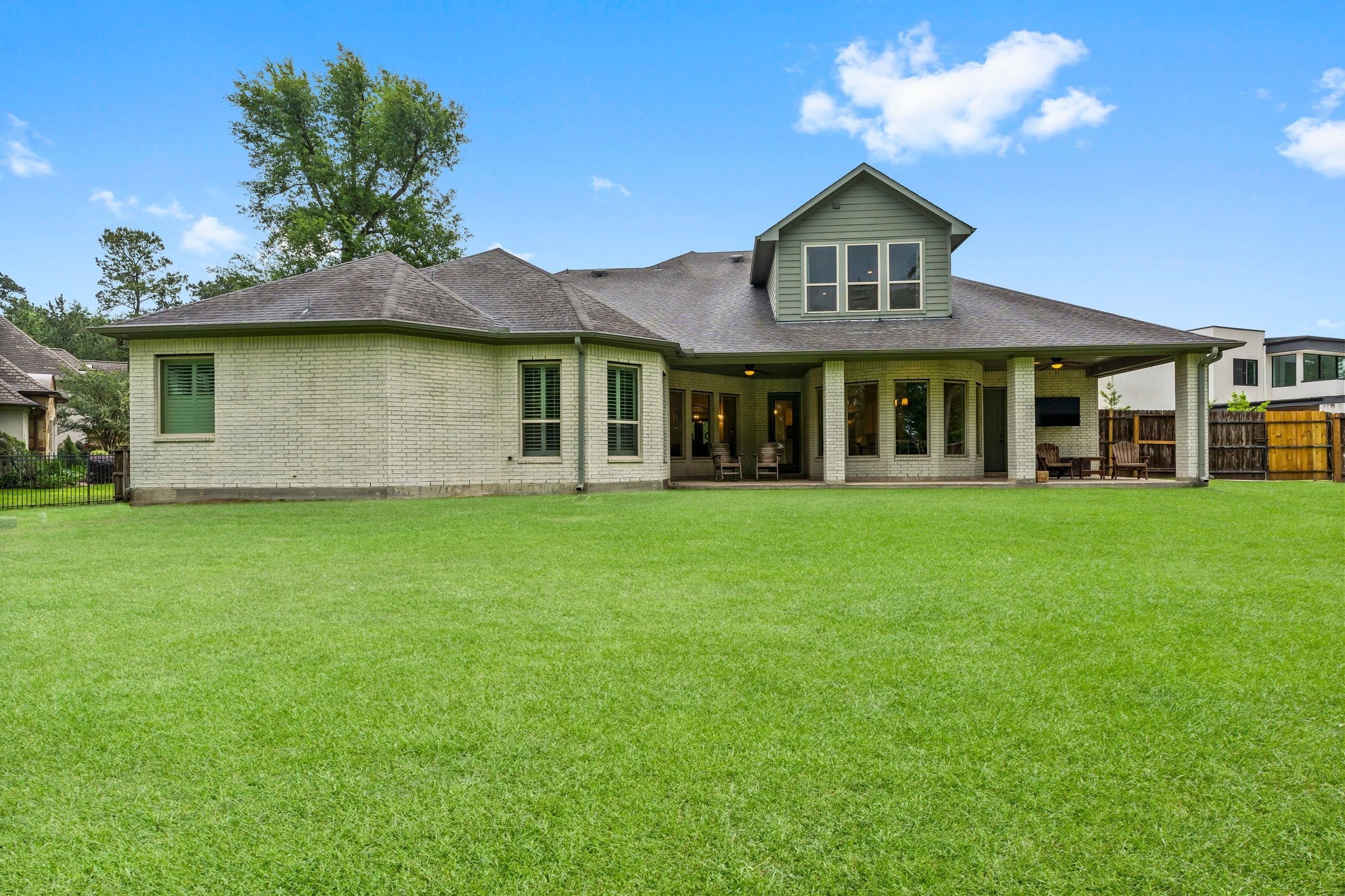 5006 Newport Court Spring, TX 77386 - Photo 44 of 46 a front view of a house with a garden