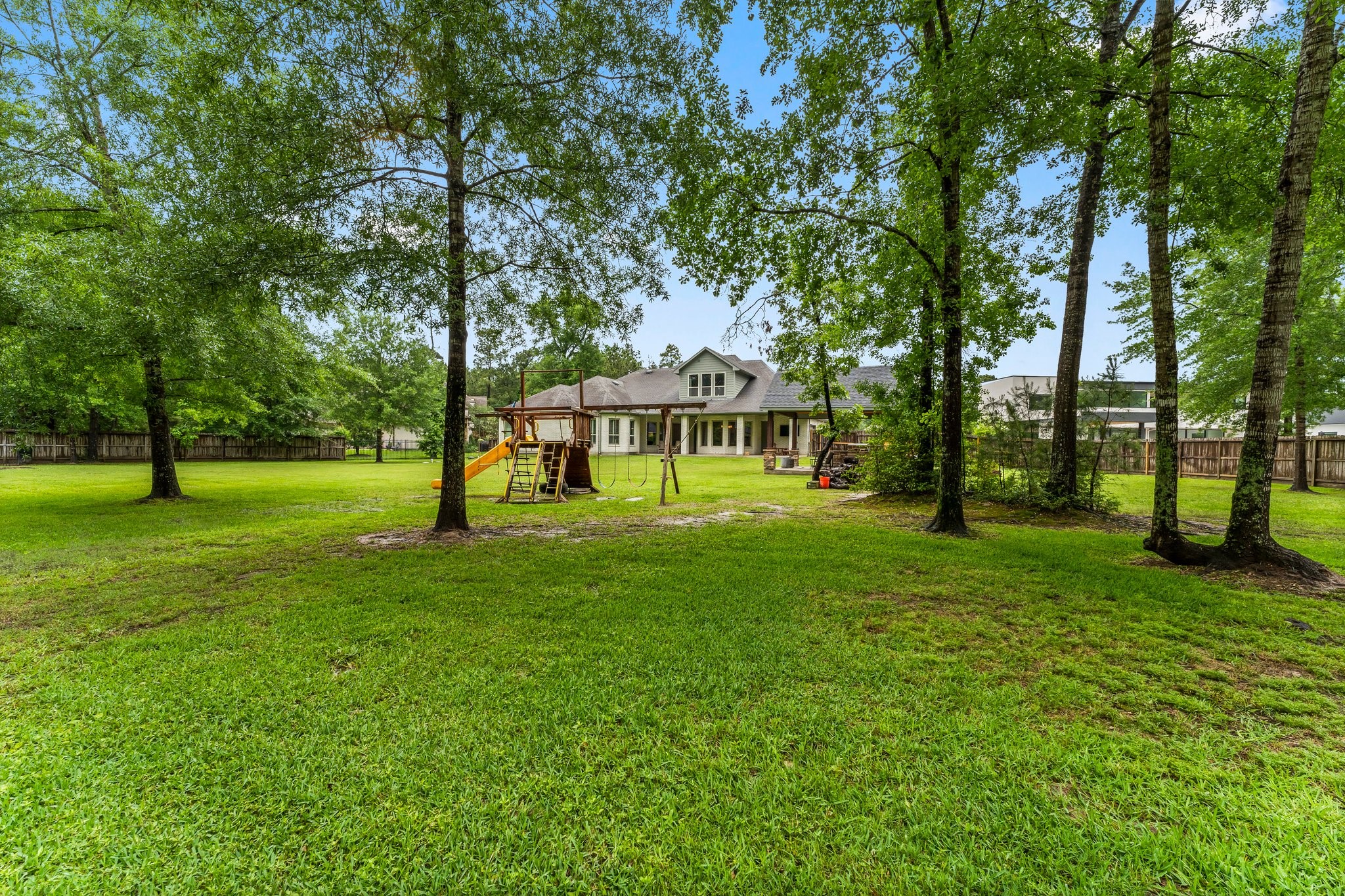 5006 Newport Court Spring, TX 77386 - Photo 46 of 46 a view of house with a backyard