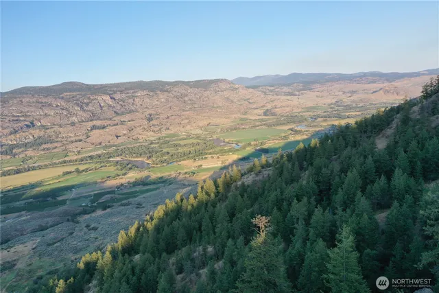 a view of ocean and mountain