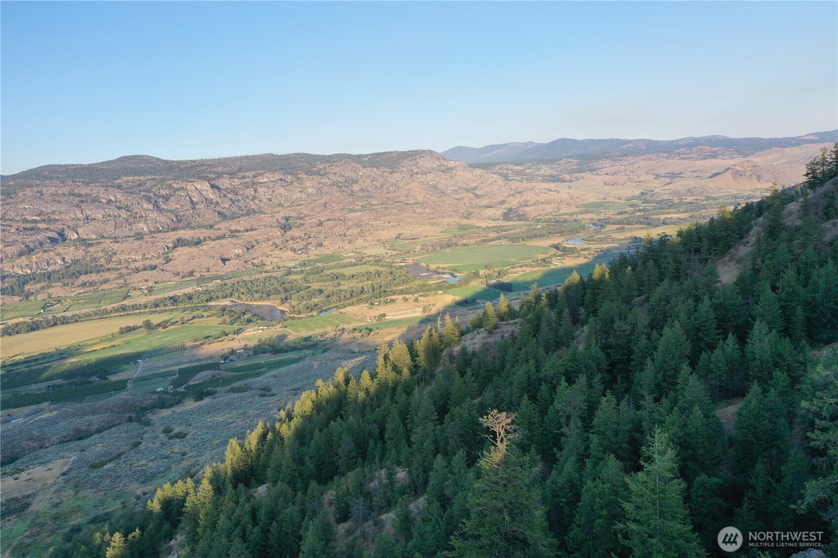a view of ocean and mountain