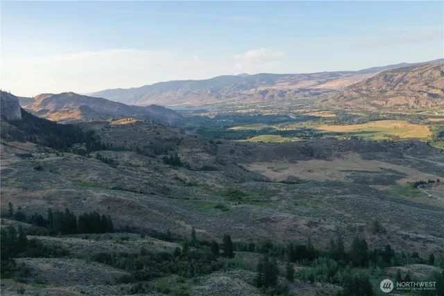 a view of mountains and valleys