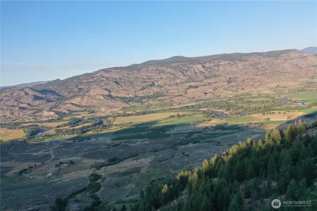 a view of mountains and valleys