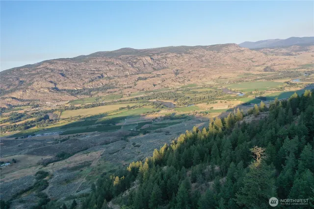 a view of ocean and mountain
