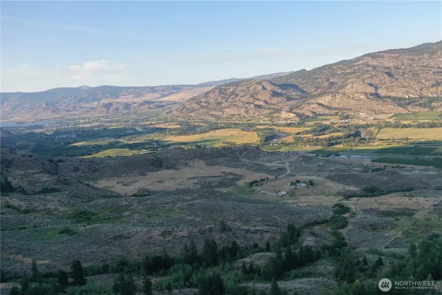 a view of mountains with an outdoor space