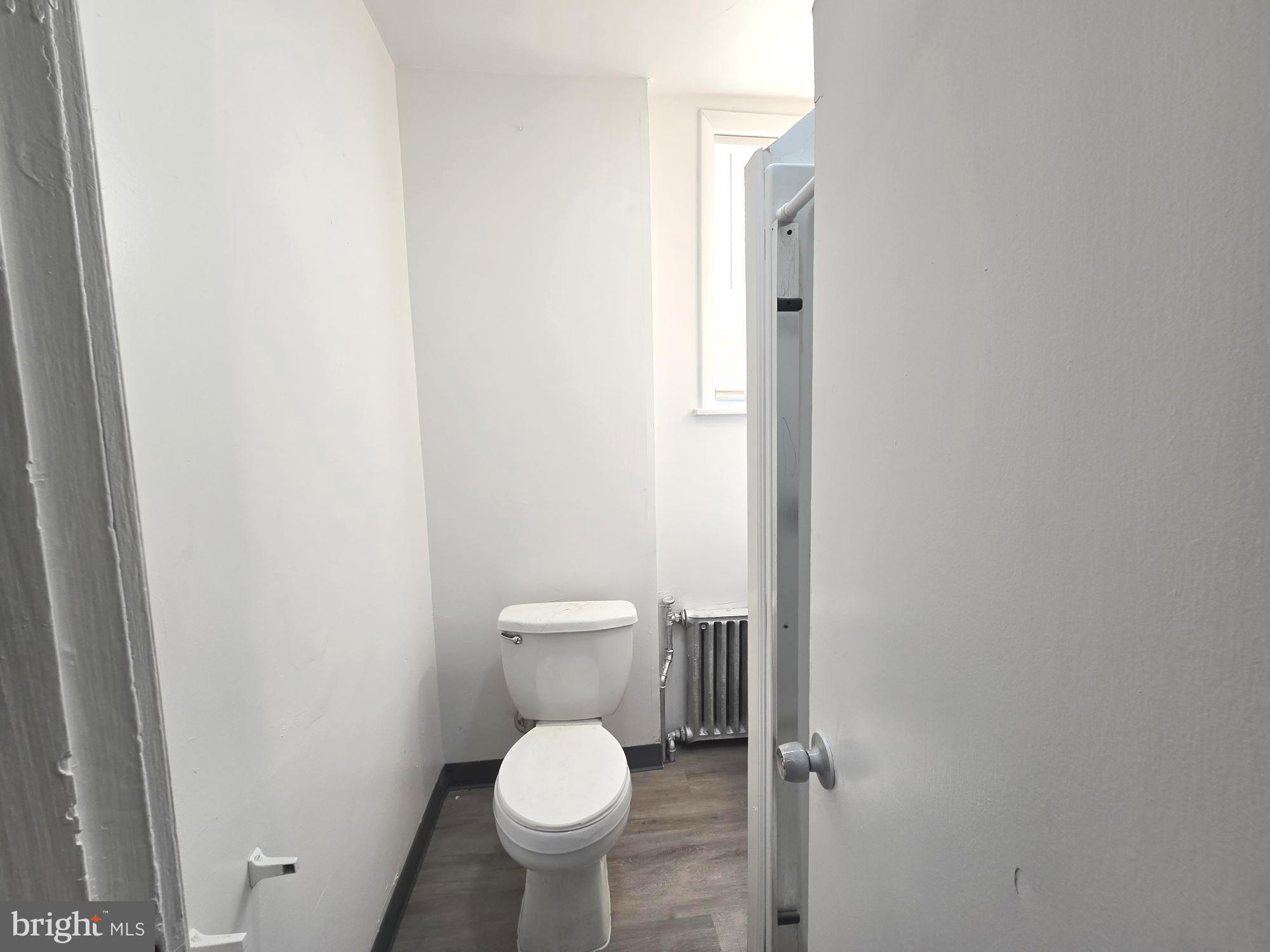 5140 North Fairhill Street Philadelphia, PA 19120 - Photo 13 of 24 a bathroom with a toilet and a sink