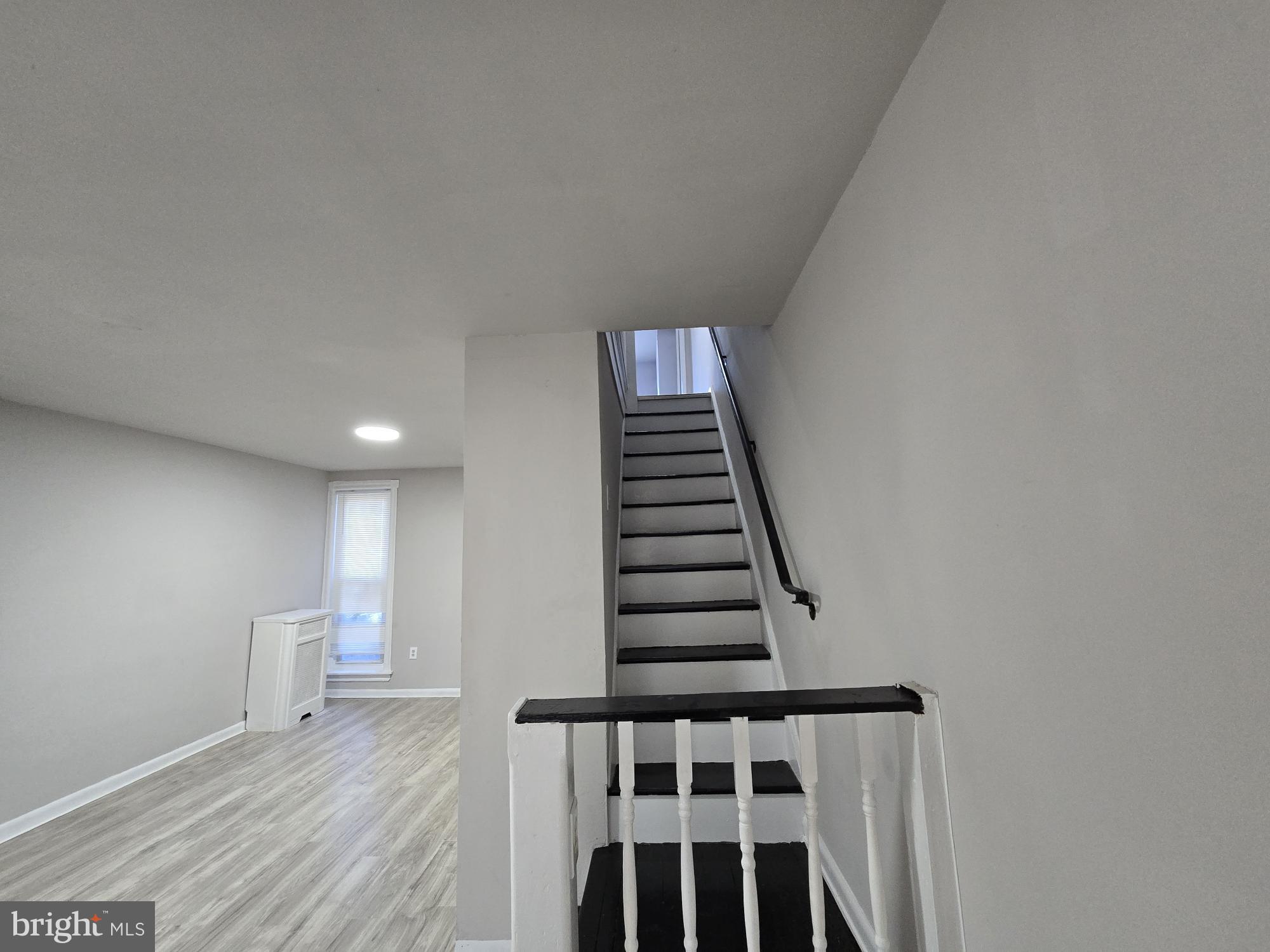 5140 North Fairhill Street Philadelphia, PA 19120 - Photo 9 of 24 a view of wooden floor and windows in a room