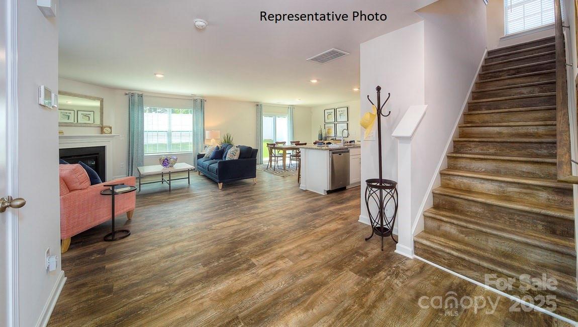 1410 Mammoth Road Hickory, NC 28602 - Photo 15 of 34 a living room with furniture and wooden floor