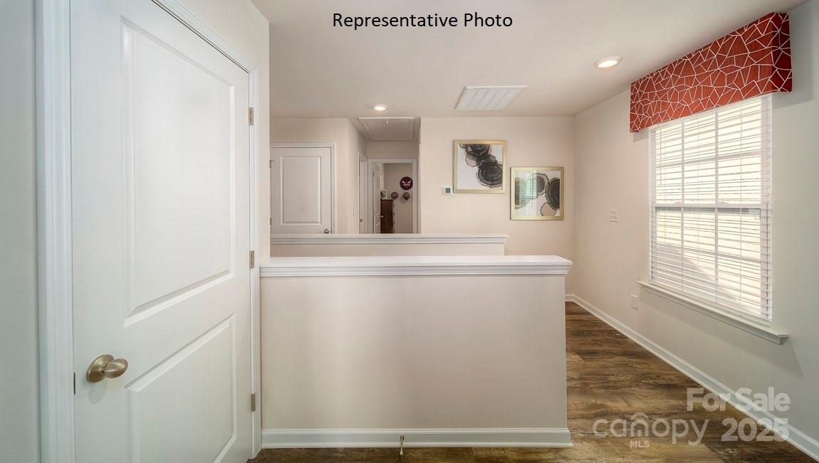 1410 Mammoth Road Hickory, NC 28602 - Photo 17 of 34 a view of hallway with window and a refrigerator