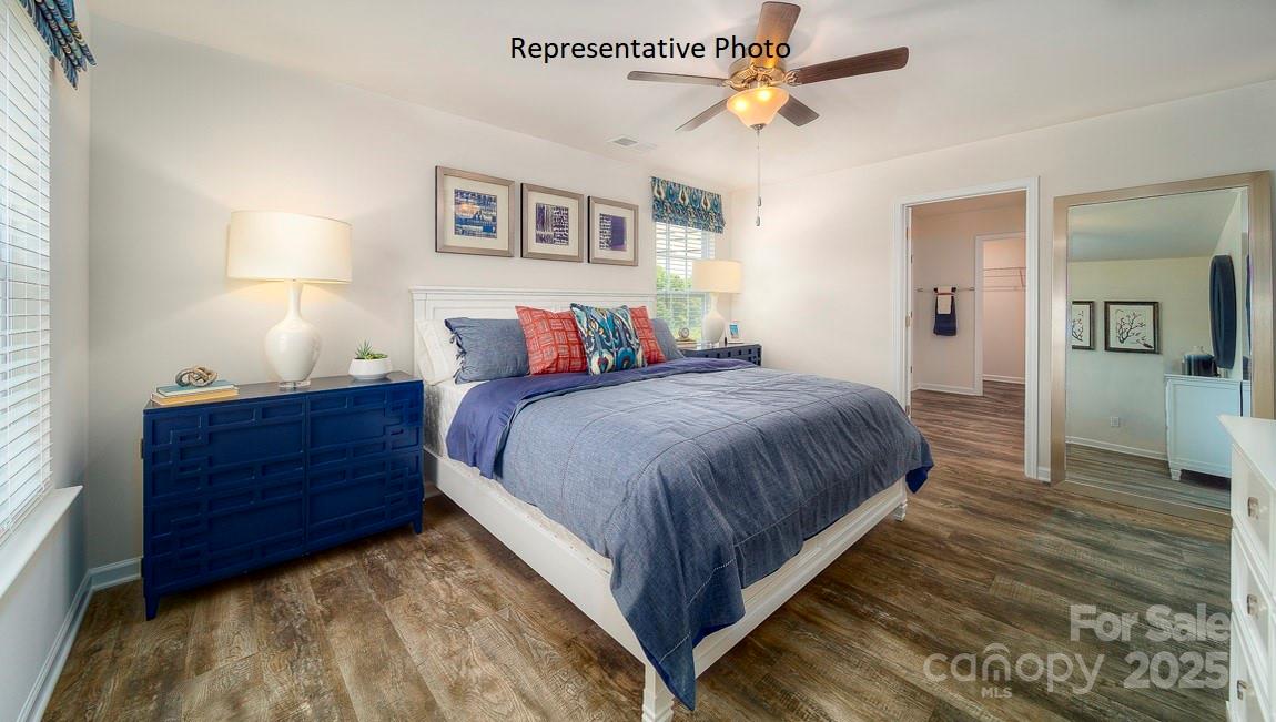 1410 Mammoth Road Hickory, NC 28602 - Photo 19 of 34 a bed room with a bed and a chandelier