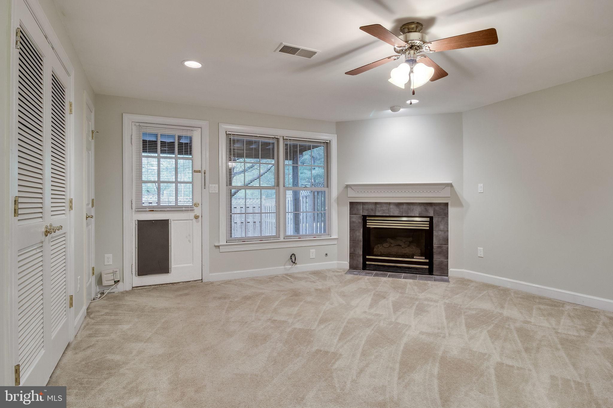 3600 Ransom Place Alexandria, VA 22306 - Photo 32 of 54 Fully finished, walk out rec room with fireplace