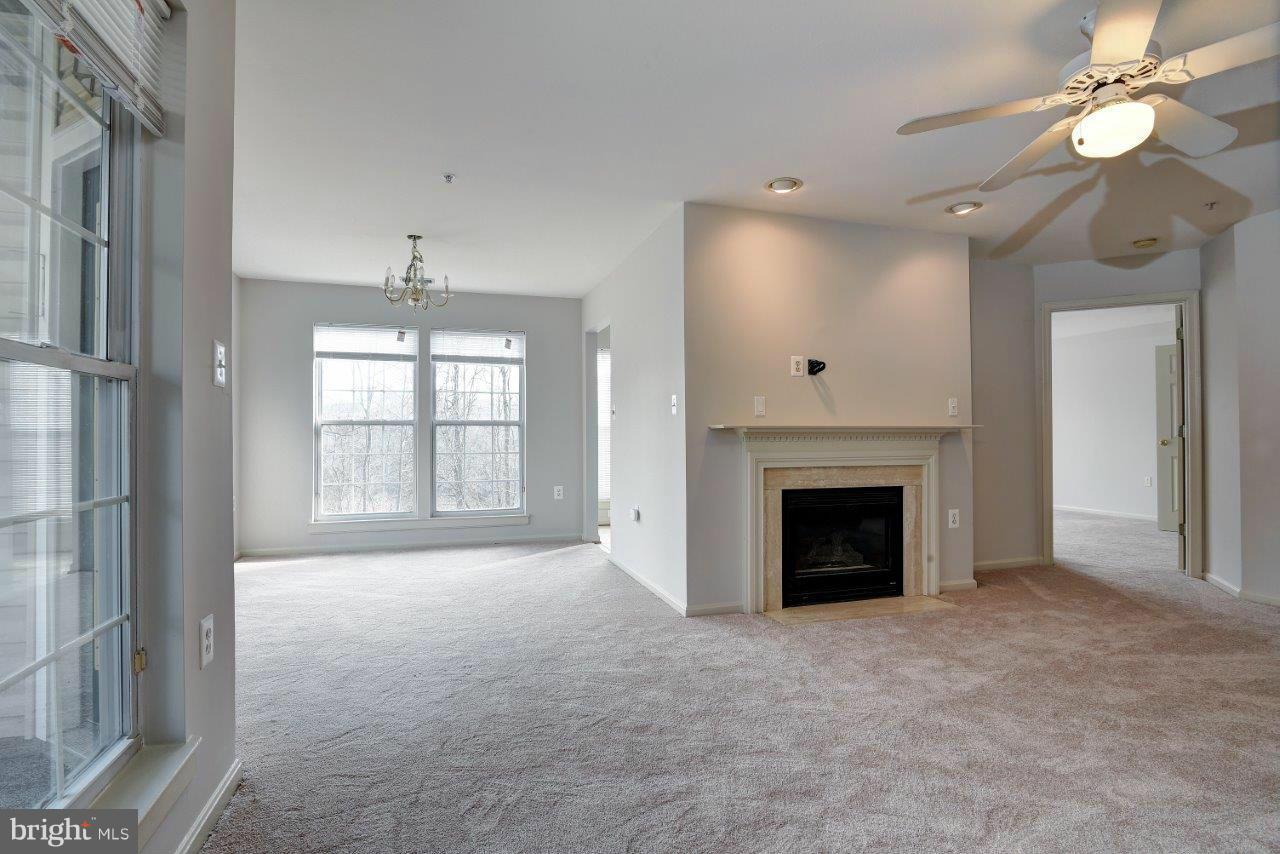 12000 Amber Ridge Circle, Unit A102 Germantown, MD 20876 - Photo 13 of 30 Living Room