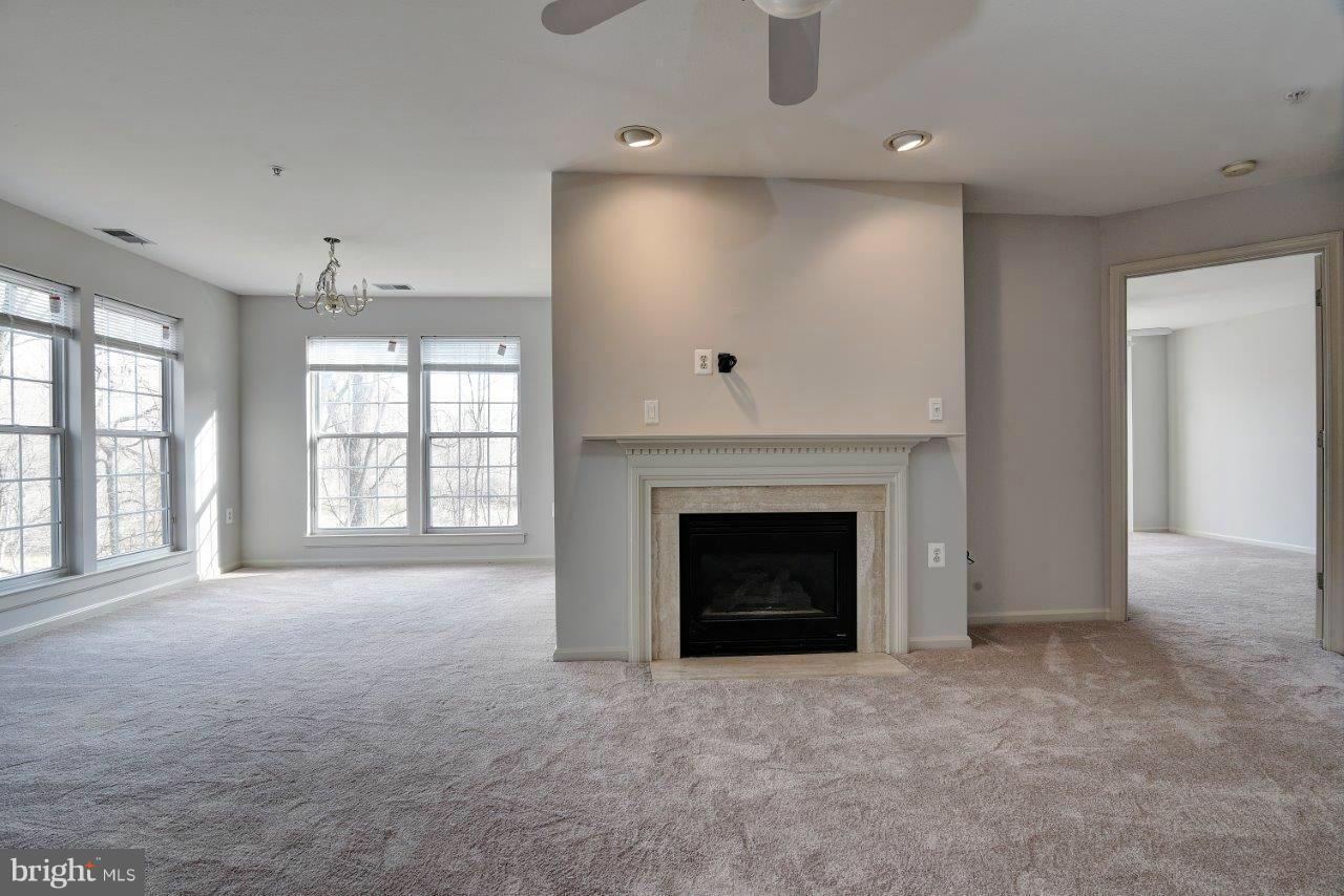12000 Amber Ridge Circle, Unit A102 Germantown, MD 20876 - Photo 22 of 30 Living Room