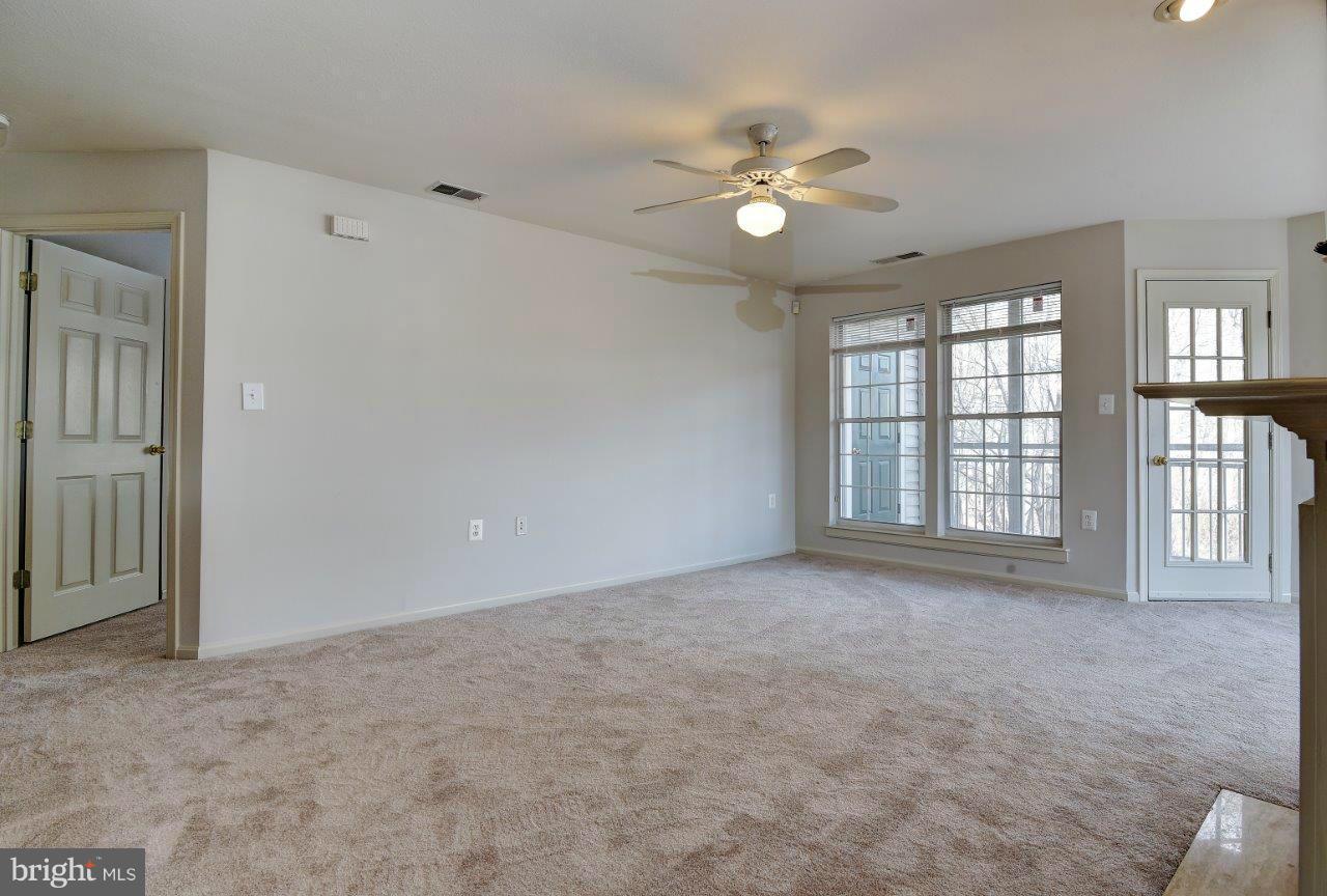 12000 Amber Ridge Circle, Unit A102 Germantown, MD 20876 - Photo 27 of 30 Living Room