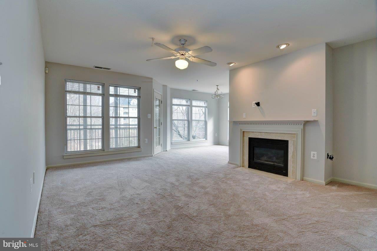 12000 Amber Ridge Circle, Unit A102 Germantown, MD 20876 - Photo 10 of 30 Living Room