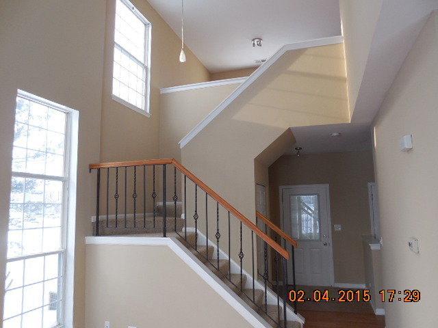 17867 Braewick Road Gurnee, IL 60031 - Photo 7 of 19 a view of an entryway with a window