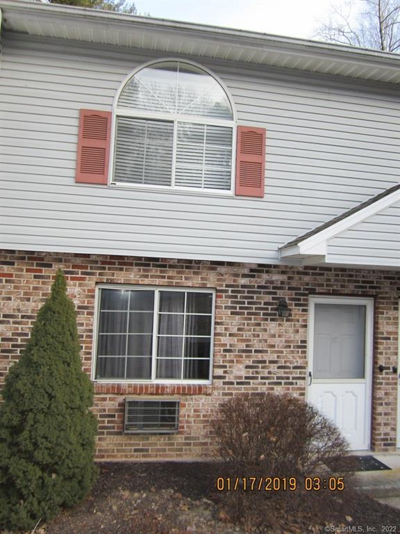 197 Pine Hill Road, Unit 1E Thomaston, CT 06787 - Photo 1 of 1 a front view of a house