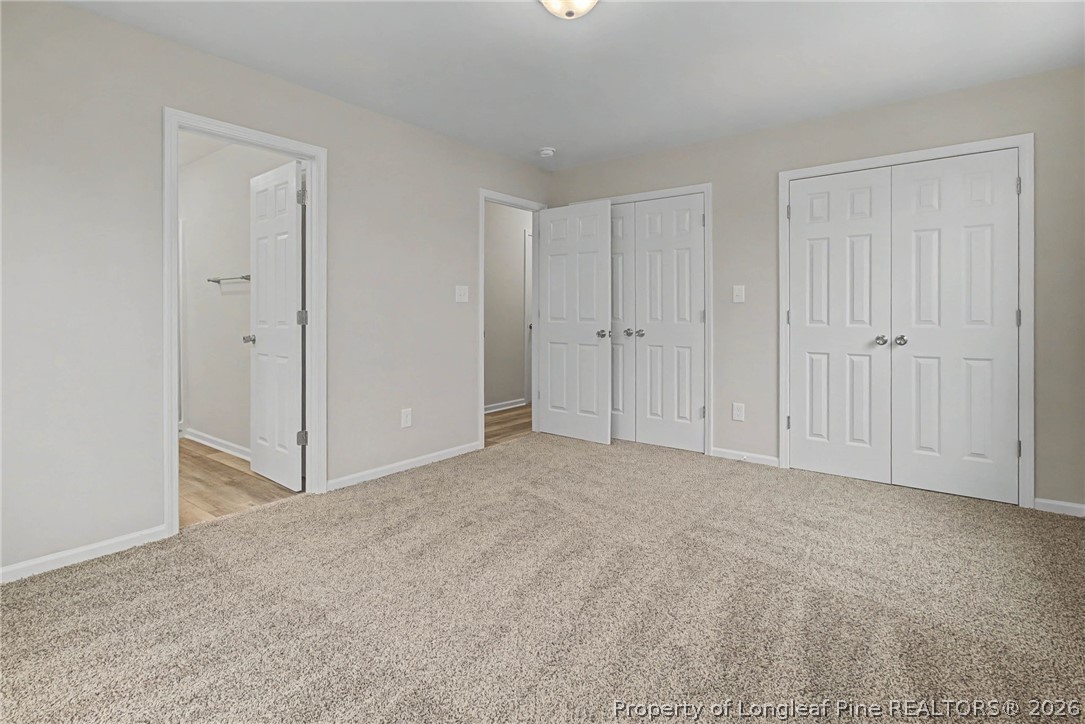 402 Rutherford Street Spring Lake, NC 28390 - Photo 19 of 34 a view of an empty room and closet area
