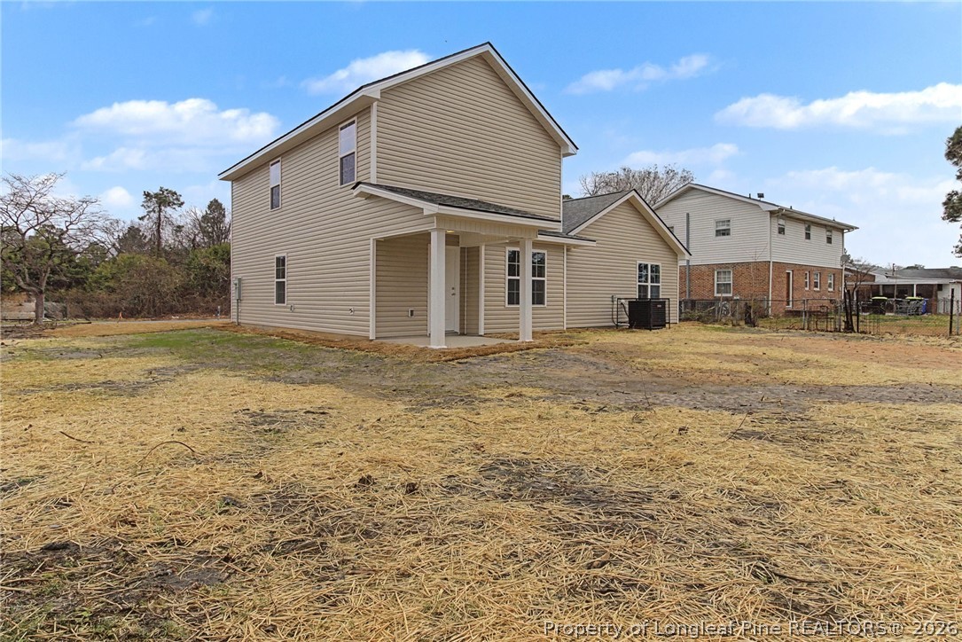 402 Rutherford Street Spring Lake, NC 28390 - Photo 34 of 34 a front view of a house with a yard