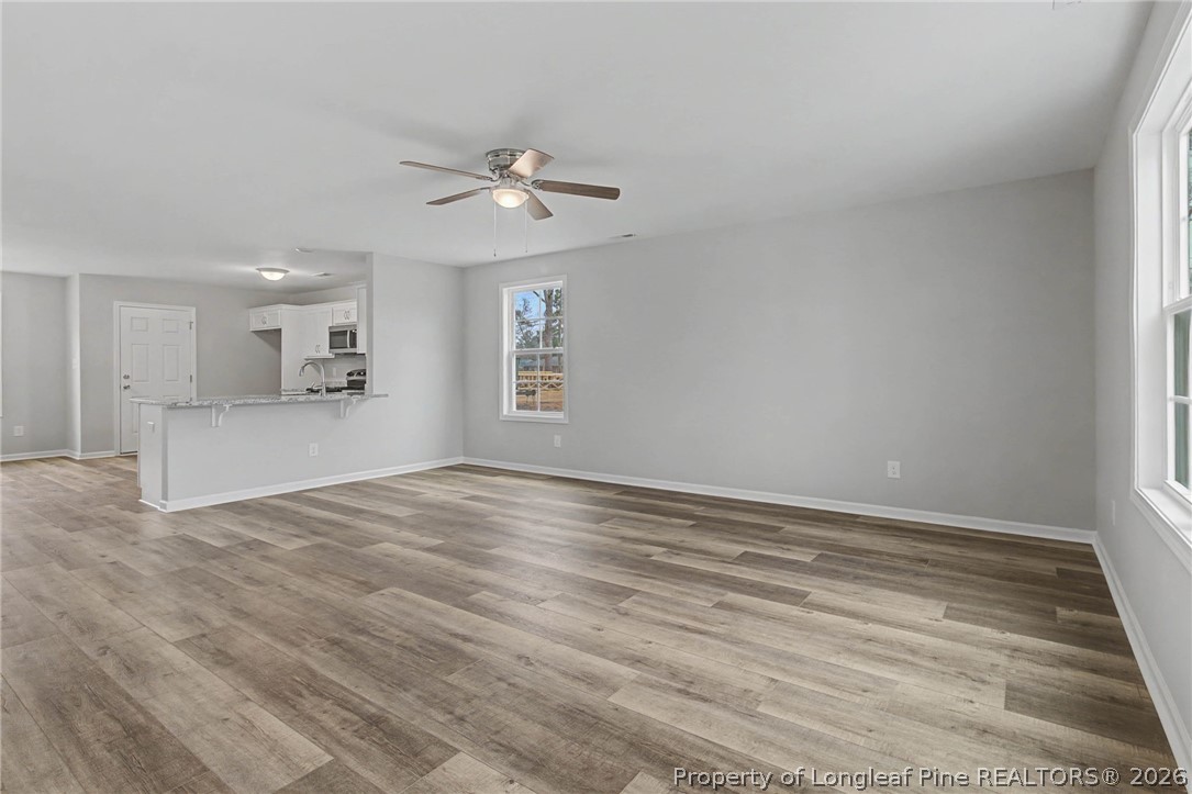 402 Rutherford Street Spring Lake, NC 28390 - Photo 6 of 34 a view of an empty room with a window