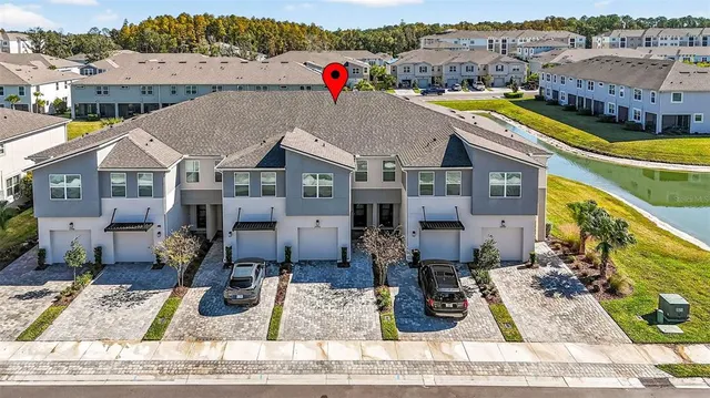 a view of a house with a swimming pool