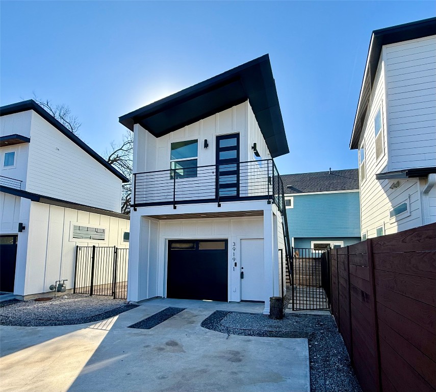 3919 East 16th Street, Unit 1 Austin, TX 78721 - Photo 3 of 11 a view of a livingroom with wooden floor and a fireplace