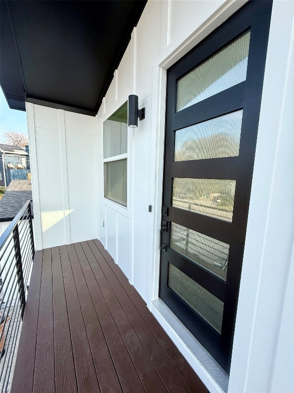 3919 East 16th Street, Unit 1 Austin, TX 78721 - Photo 4 of 11 a view of front door with wooden floor
