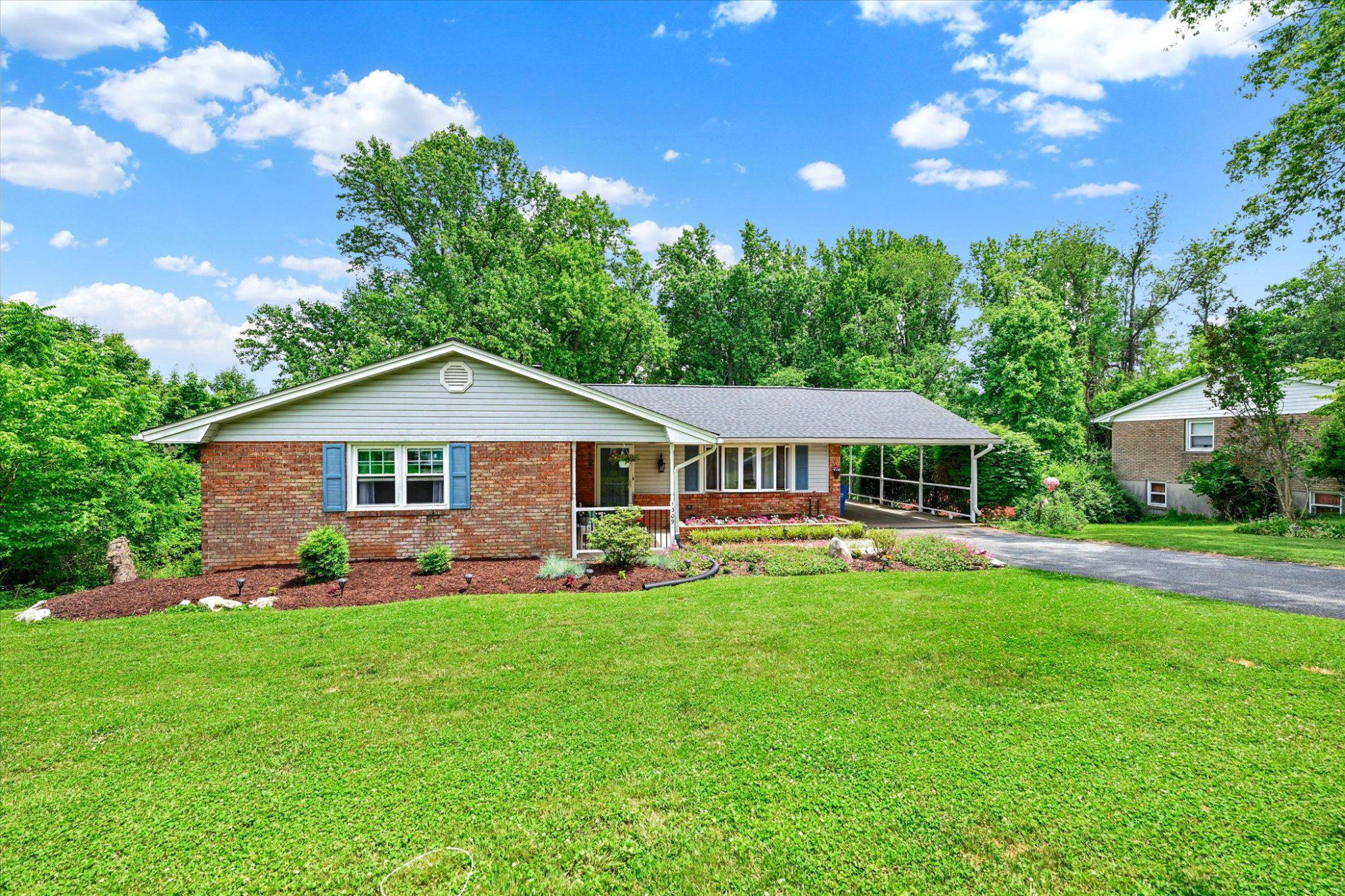 1309 Mill Creek Road Fallston, MD 21047 - Photo 2 of 44 Charming rancher with lush greenery backdrop.