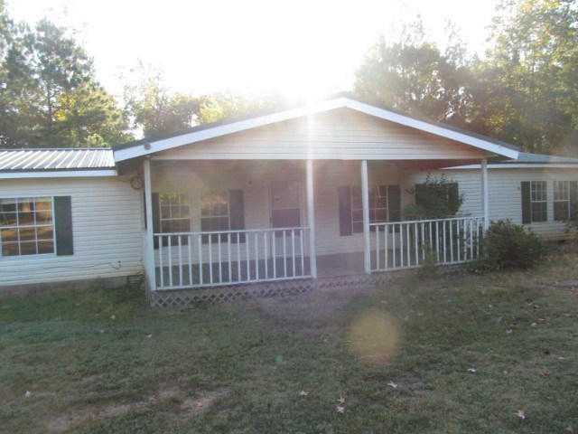 170 Hamlin Road Jackson, GA 30233 - Photo 1 of 6 a view of a house with a yard