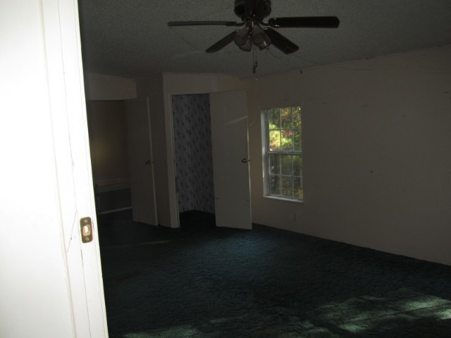 170 Hamlin Road Jackson, GA 30233 - Photo 4 of 6 a view of a livingroom with a fan