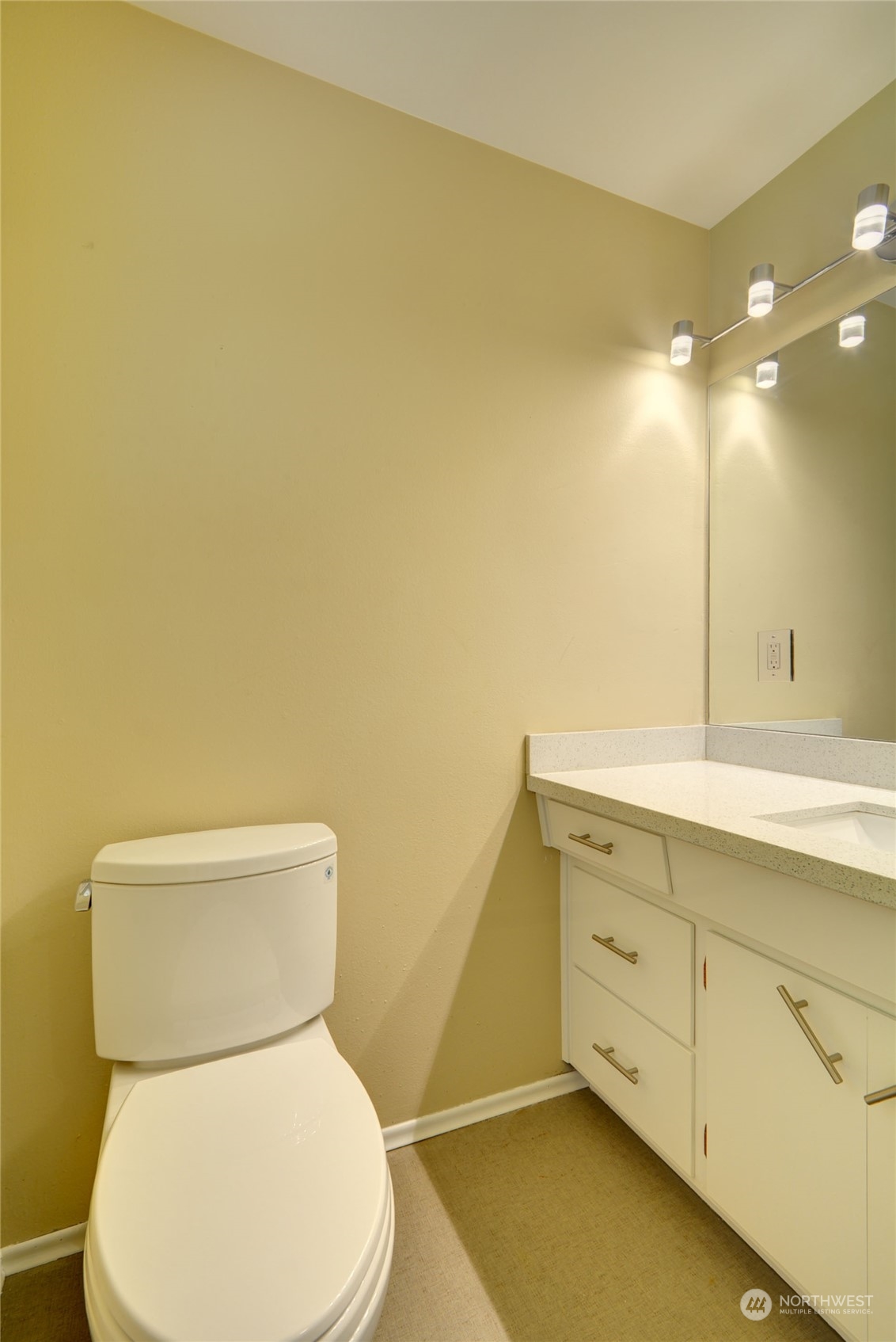 4608 Strumme Road Bothell, WA 98012 - Photo 16 of 30 a bathroom with a toilet sink and mirror